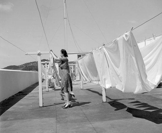 Woman hanging washing